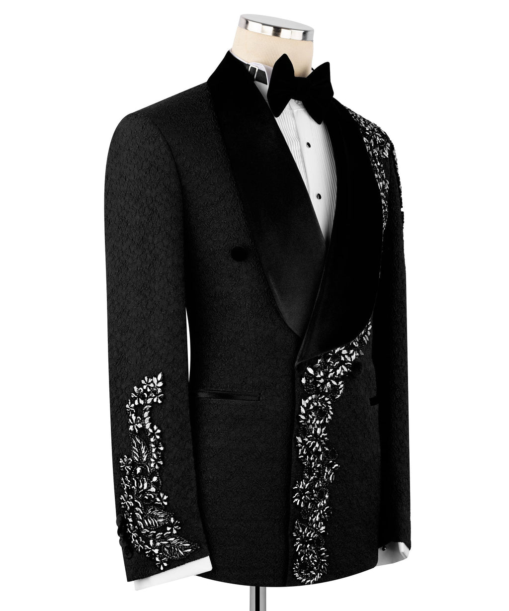 Black tuxedo jacket with velvet lapels and silver floral embroidery on chest and sleeve