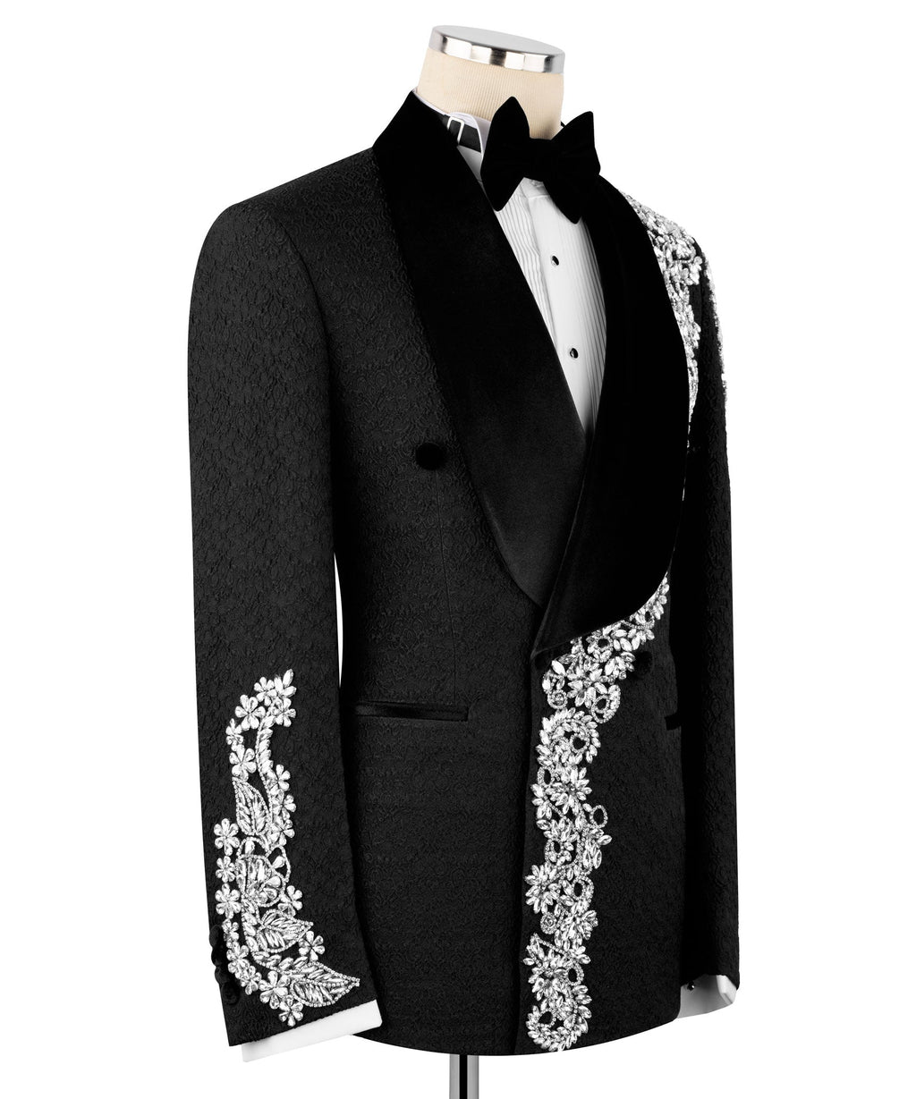 Black tuxedo jacket with velvet lapel and silver-tone floral embroidery on sleeve and front