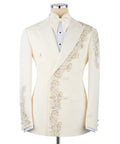 Ivory tuxedo jacket with bow tie, stone-embroidered floral trim on lapel and sleeves