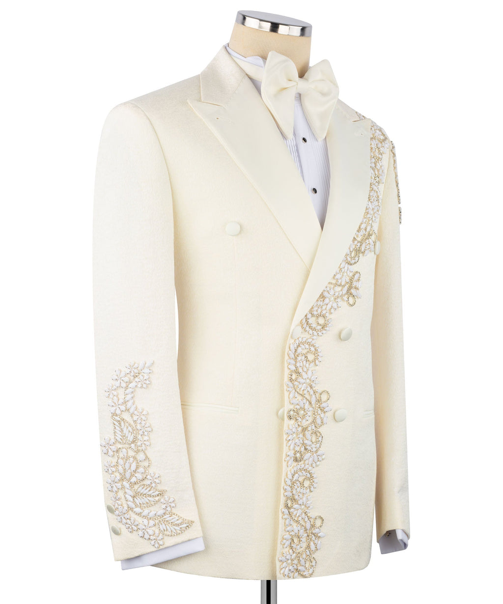 Ivory tuxedo jacket side view with bow tie and gold-toned stone embroidery along front