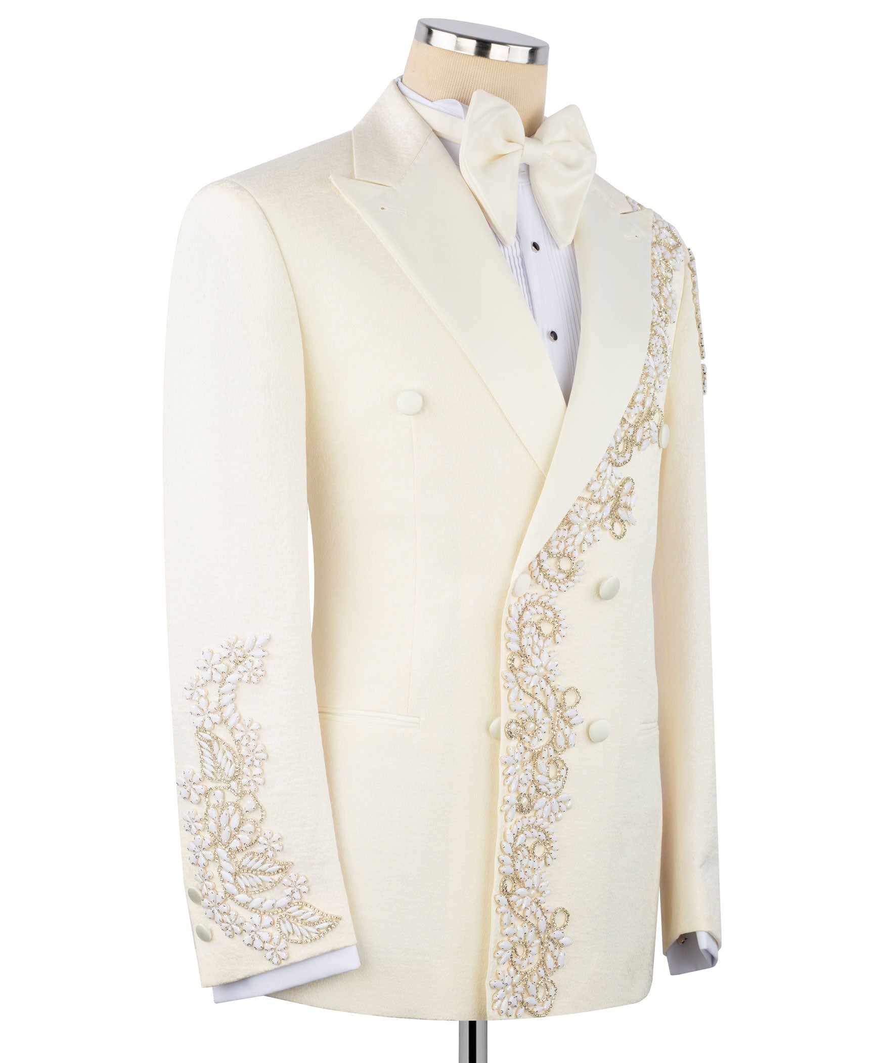 Ivory tuxedo jacket side view with bow tie and gold-toned stone embroidery along front