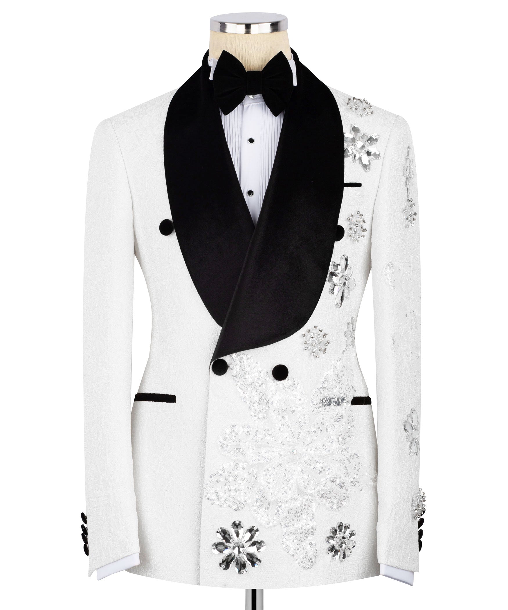 White tuxedo jacket with black satin lapels, bow tie, and sparkling floral hand-embroidery