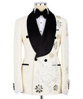 Ivory tuxedo jacket with black velvet lapels, bow tie, and silver jeweled floral embroidery