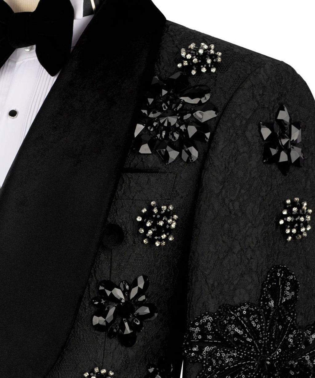 Stone and rhinestone floral embroidery on black tuxedo jacket lapel and chest