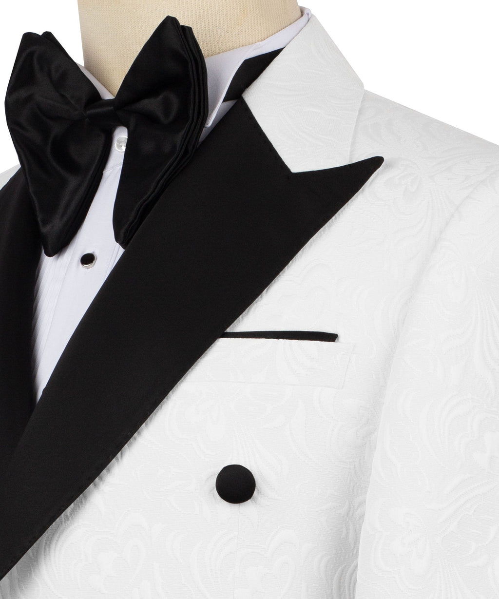 Close-up: black bow tie and black lapel on white double-breasted tuxedo jacket