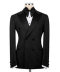 Black double-breasted tuxedo jacket with satin bow tie and patterned lapels
