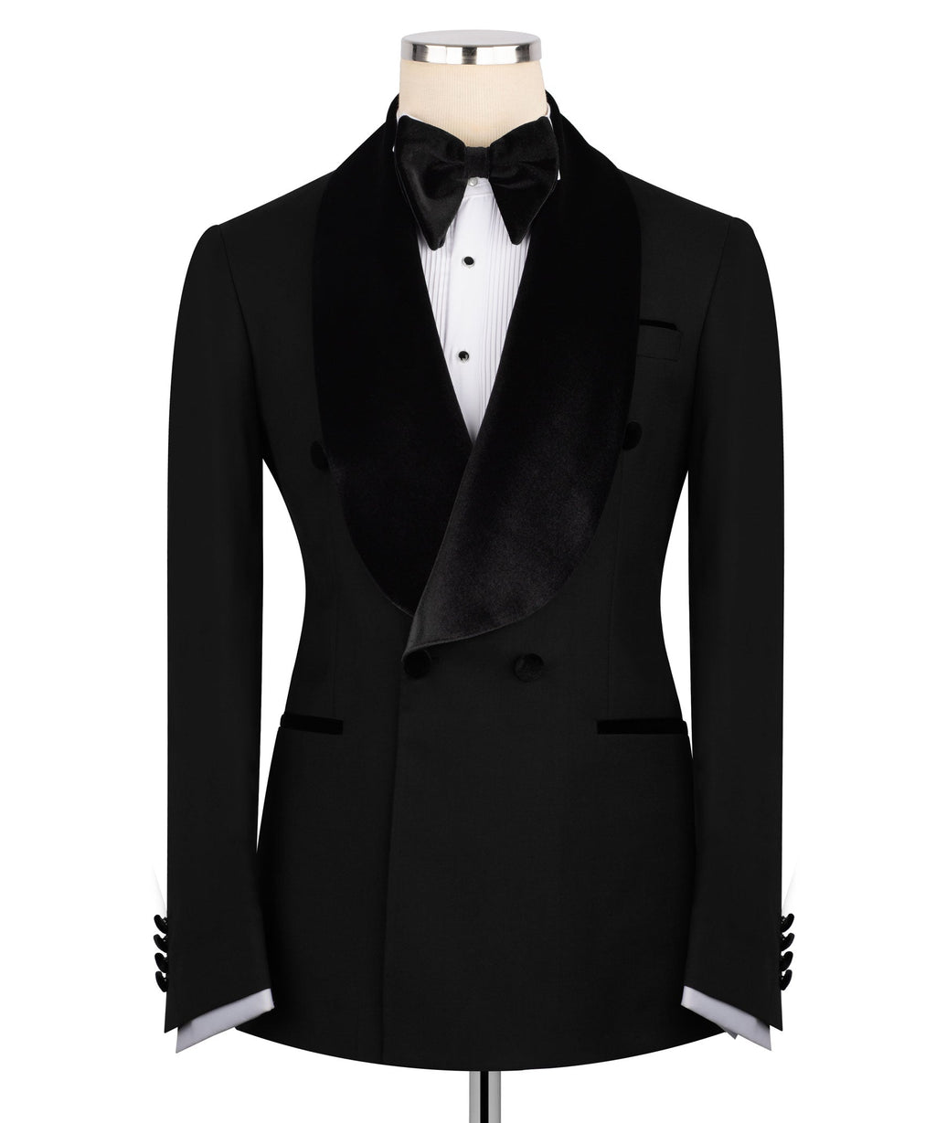 Black velvet-collar tuxedo jacket with satin bow tie, covered buttons, and waistcoat