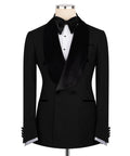 Black velvet-collar tuxedo jacket with satin bow tie, covered buttons, and waistcoat