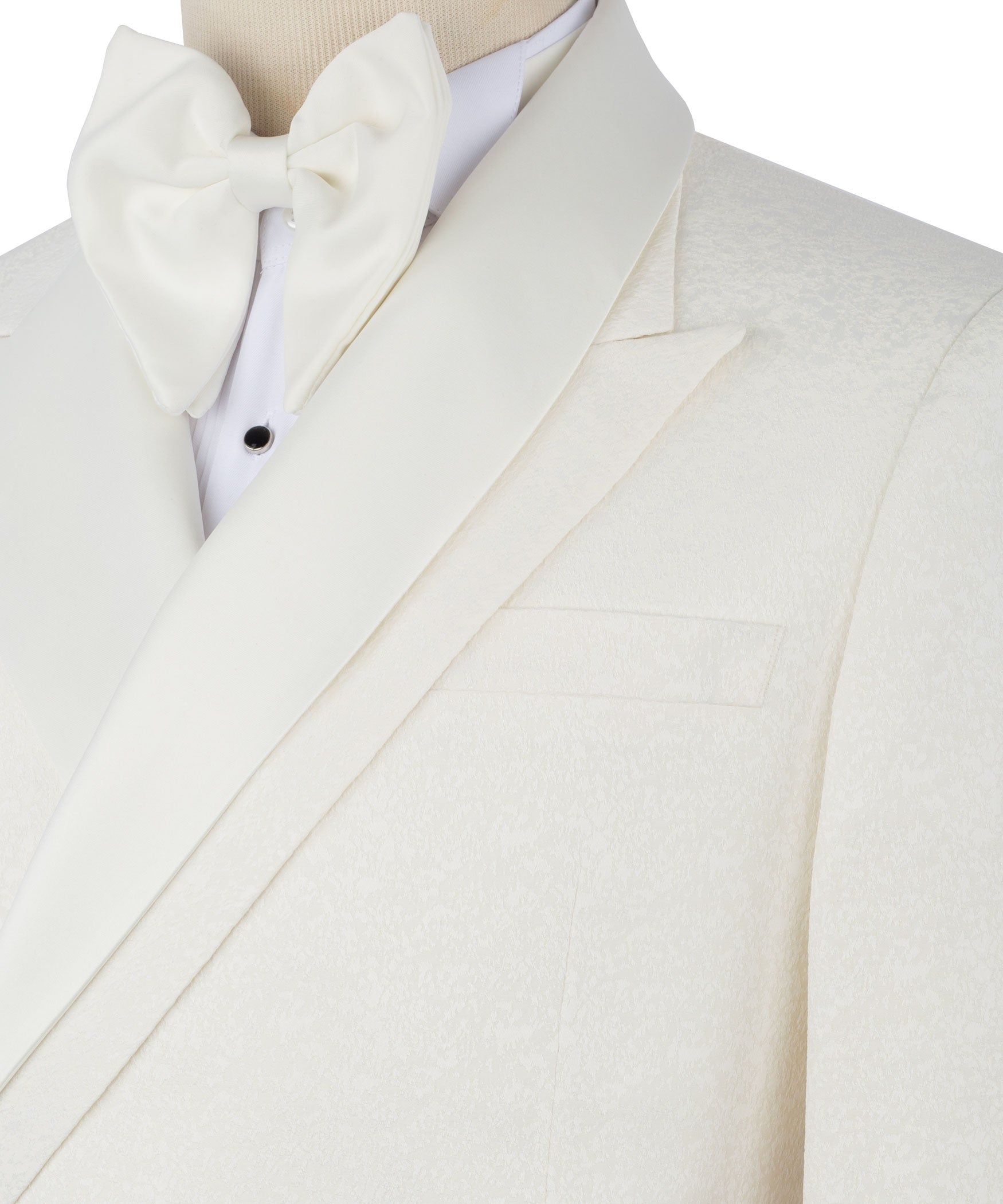 Close-up of cream tuxedo blazer lapel, bow tie, and single chest pocket