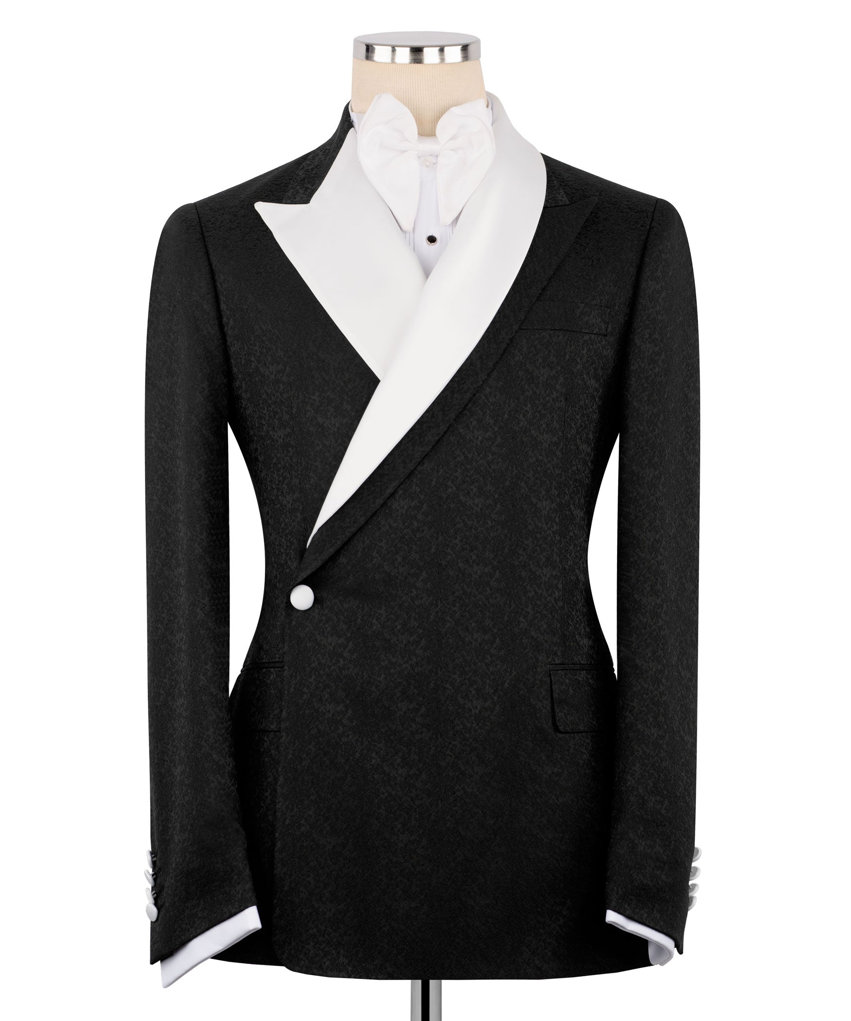 Black double-breasted tuxedo jacket with satin lapel, white shirt and bow tie