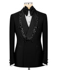 Black tuxedo jacket with stone-embroidered trim and satin bow tie