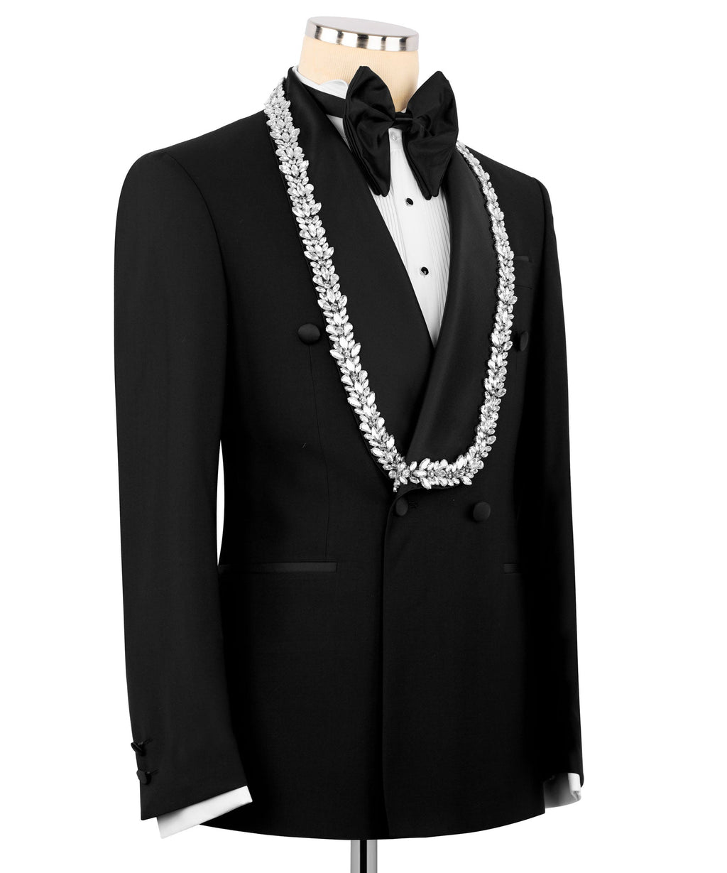 Black tuxedo jacket with white stone-embroidered trim along lapels and V-front vest
