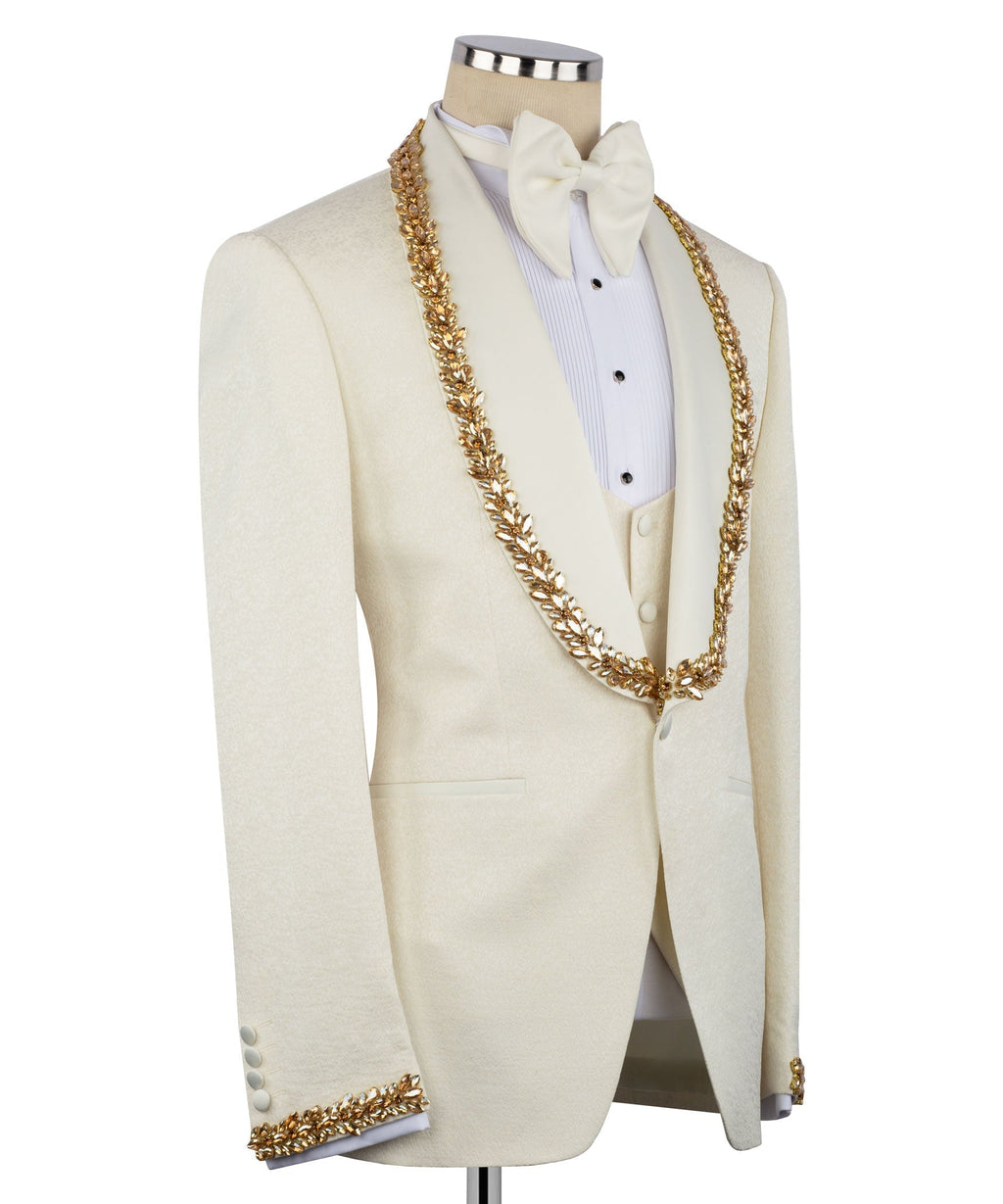 Light cream tuxedo set with gold embroidered trim and white buttoned shirt, bow detail