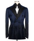 Blue tuxedo jacket with black gemstone-embellished lapels and bow tie