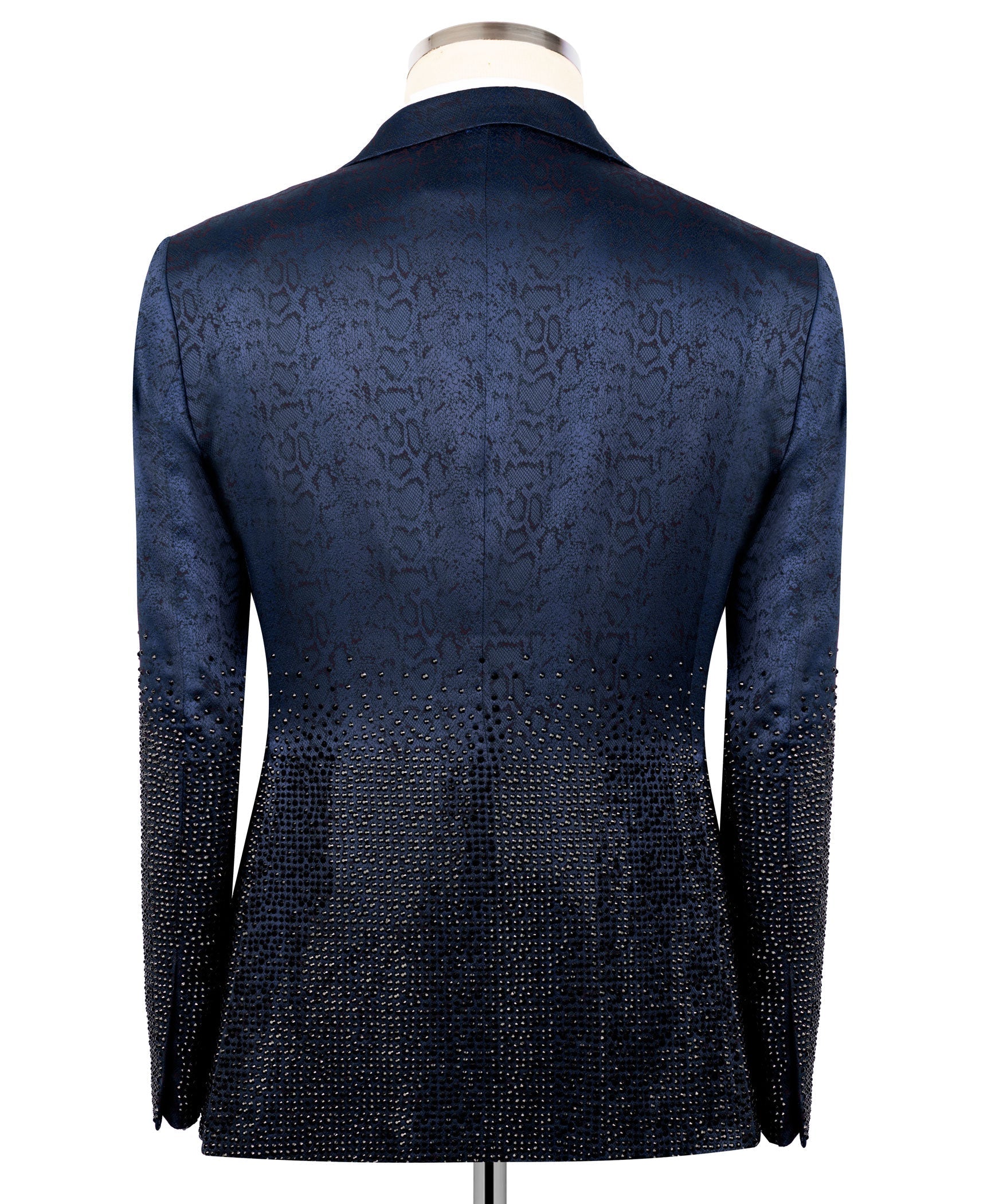 Blue tuxedo jacket back view with textured, jeweled lower panels