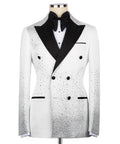 White tuxedo jacket with black satin lapels, bow tie, and double-breasted buttons