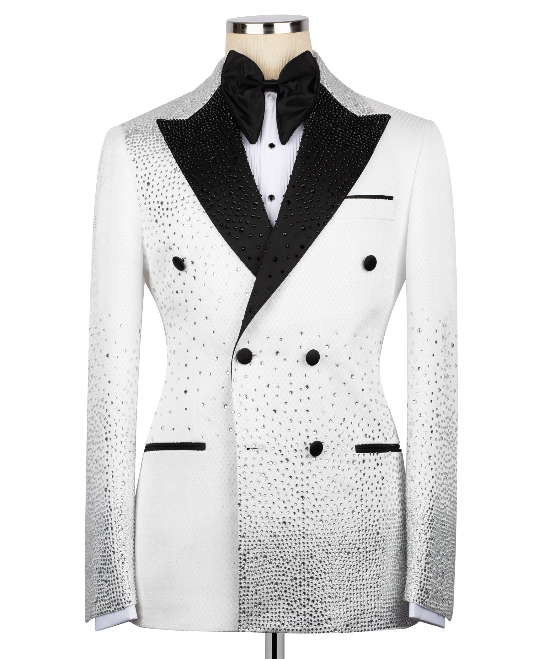 White tuxedo jacket with black satin lapels, bow tie, and double-breasted buttons