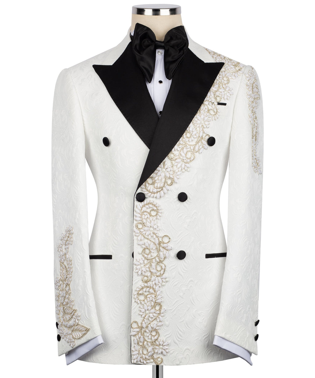 White tuxedo jacket with black lapels, bow tie, and gold stone embroidery