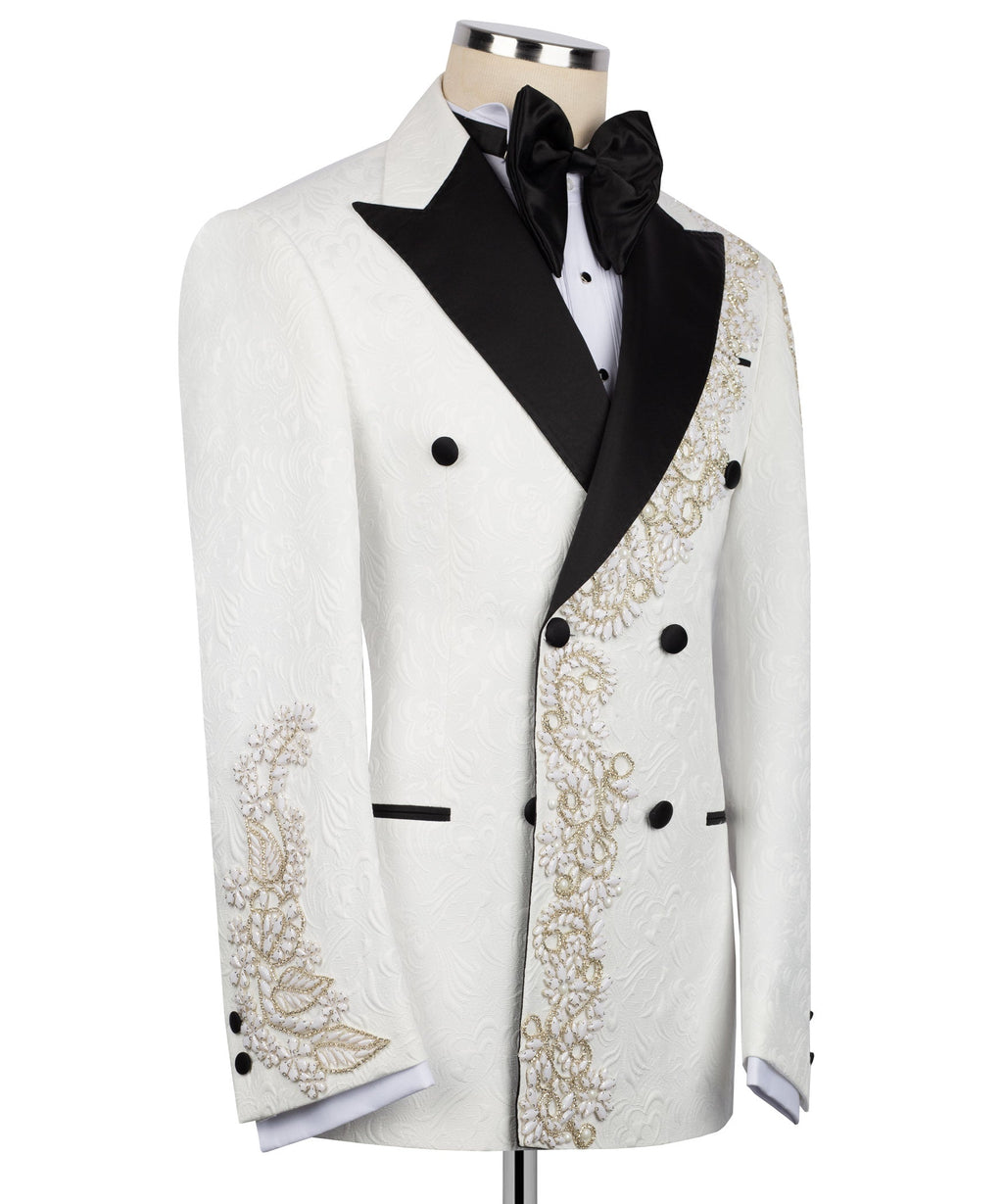 White double-breasted tuxedo jacket with black sash lapel and gold stone trim