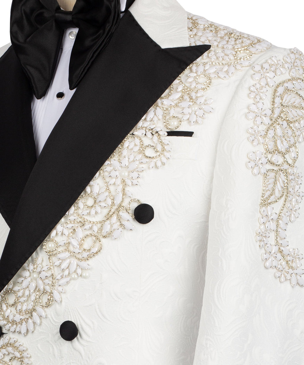 White tuxedo front close-up with gold stone embroidery and black bow tie