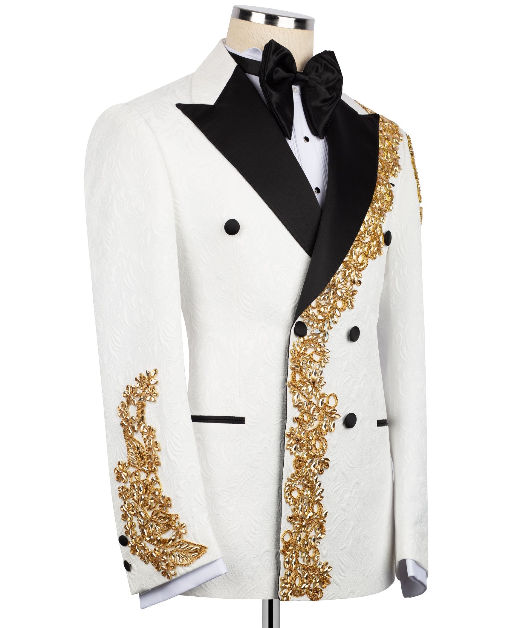 White tuxedo jacket side view with black lapel and gold embroidered stone trim