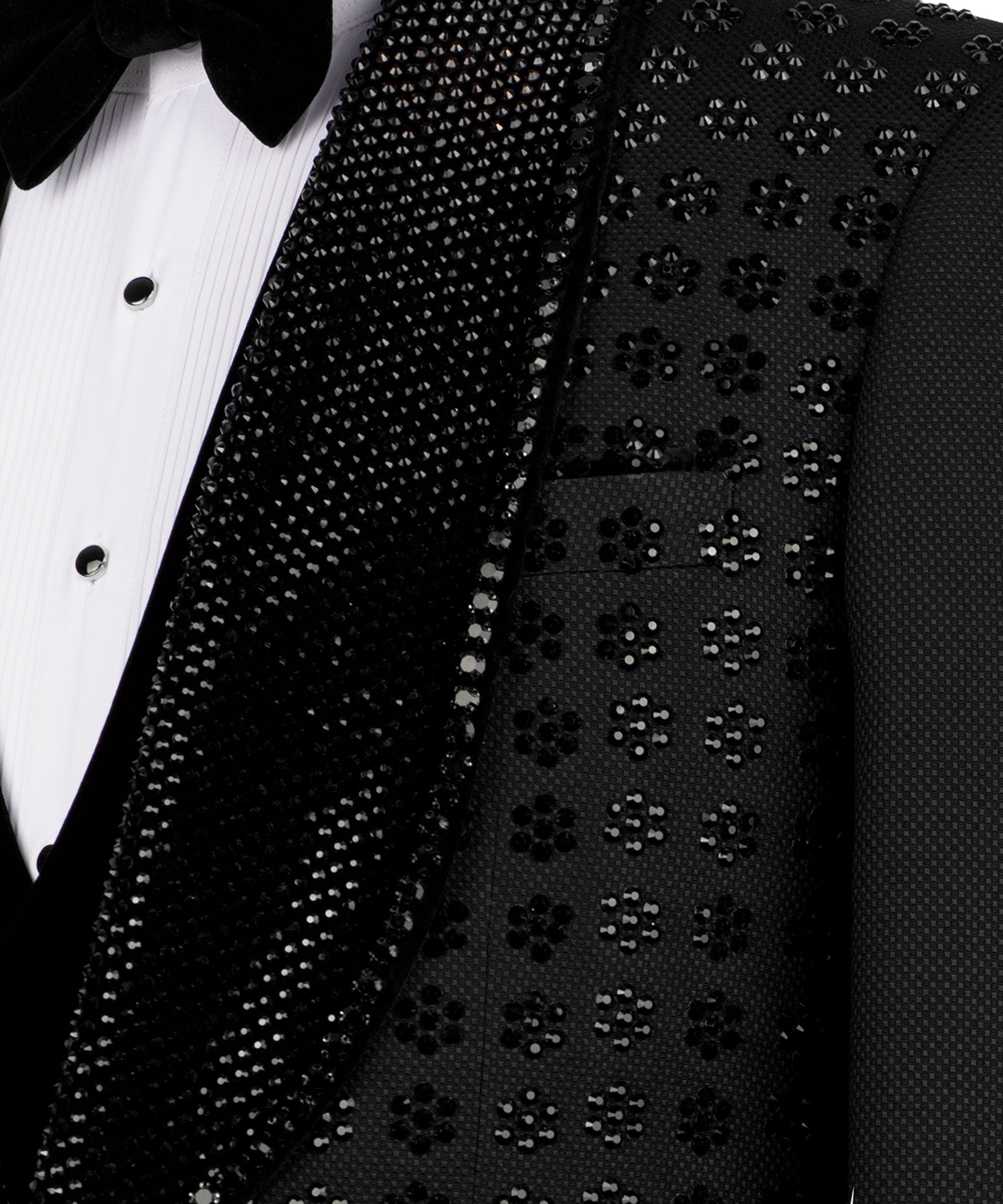 Close-up: black embroidered tuxedo vest and lapel with sparkling beadwork