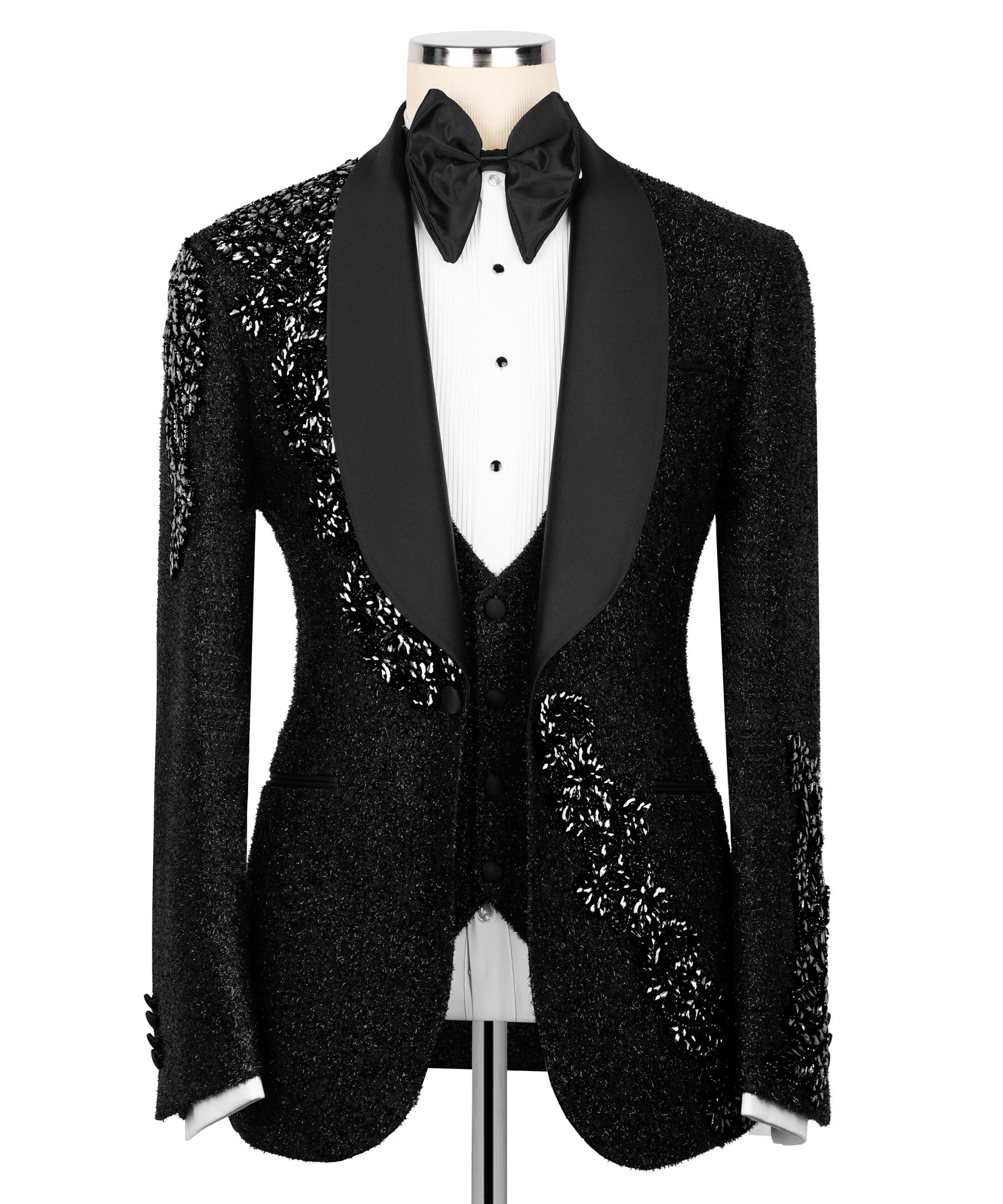Black tuxedo jacket with bow tie, satin lapels, and stone-embroidered details