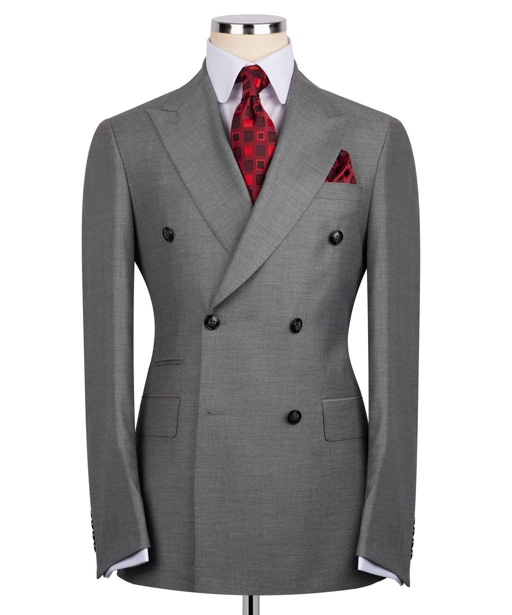 Grey double-breasted suit jacket with notched lapels, black buttons, and red patterned tie