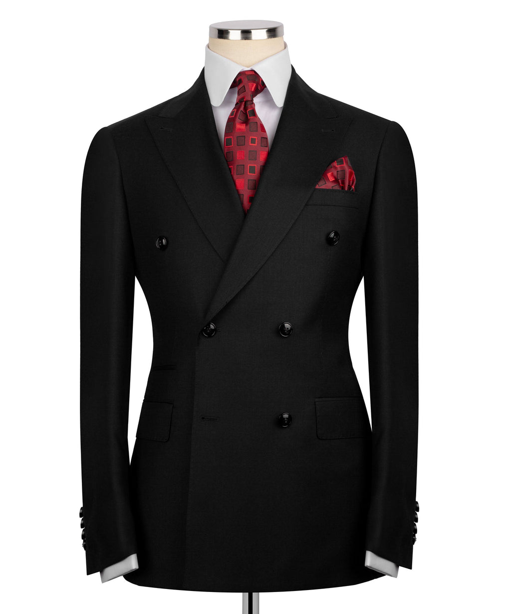 Black double-breasted suit jacket, red patterned tie and pocket square