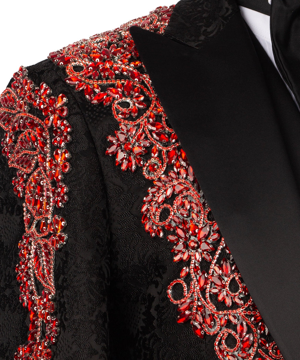 Close-up: black tuxedo jacket with red jeweled embroidery and beaded details