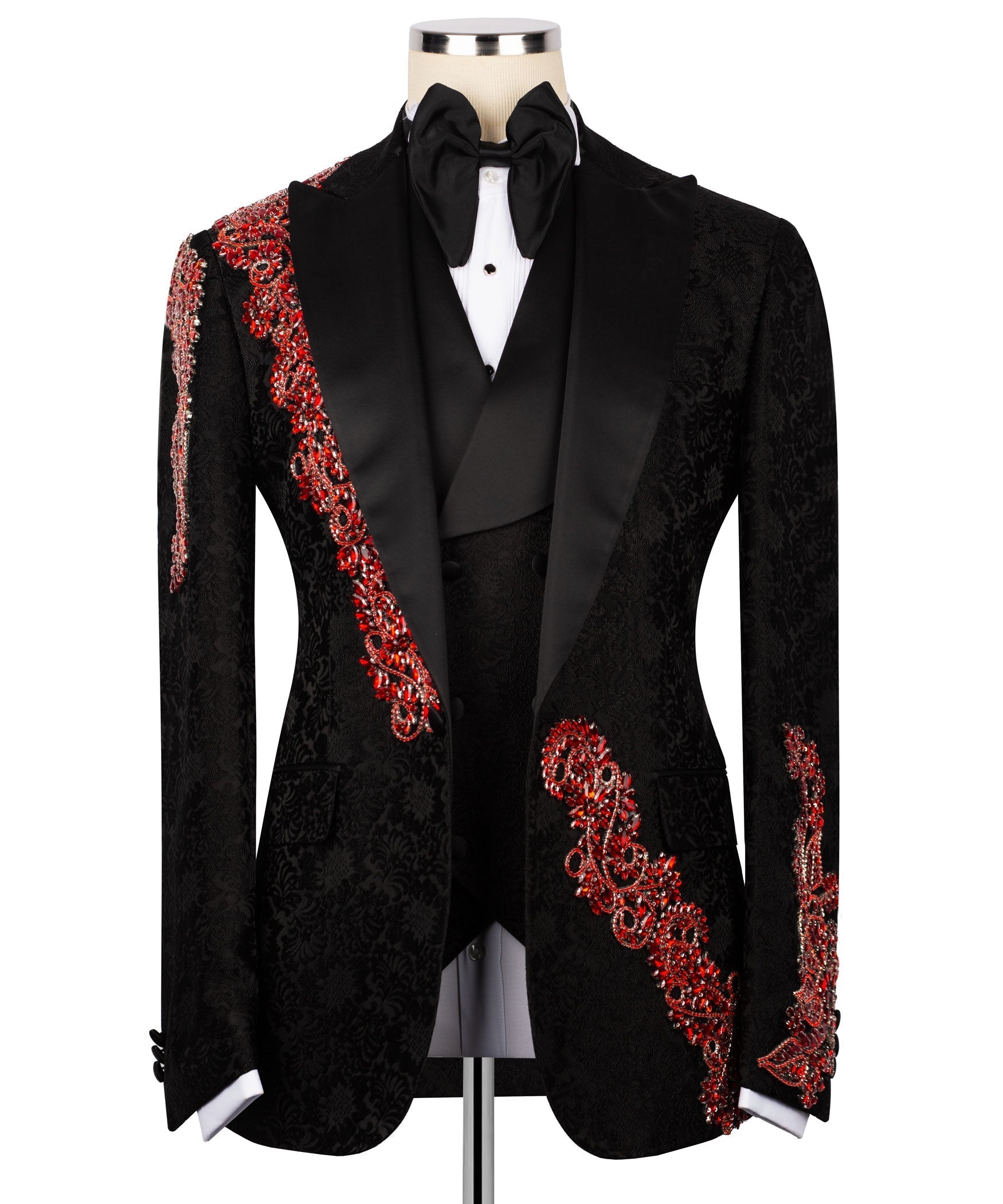 Black tuxedo jacket with red jeweled embroidery trim and satin lapels, bow tie