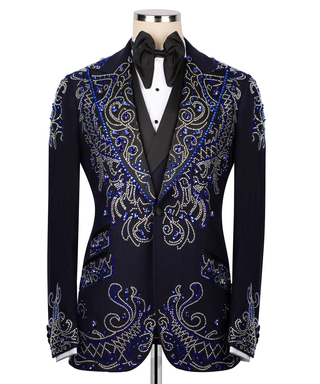 Black tuxedo jacket with blue and silver rhinestone scroll embroidery, full front view