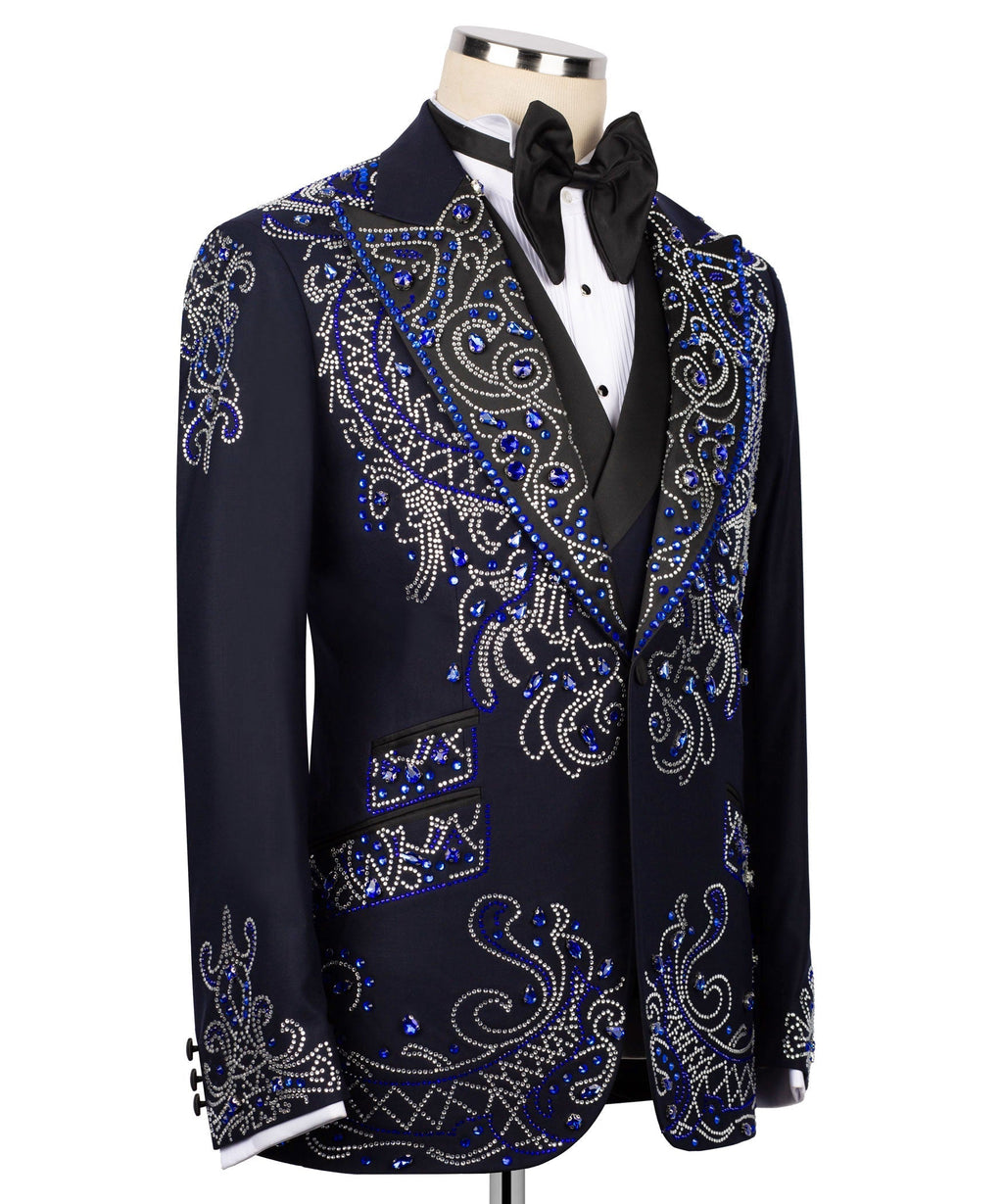 Black tuxedo jacket with blue and silver rhinestone paisley embroidery, angled view