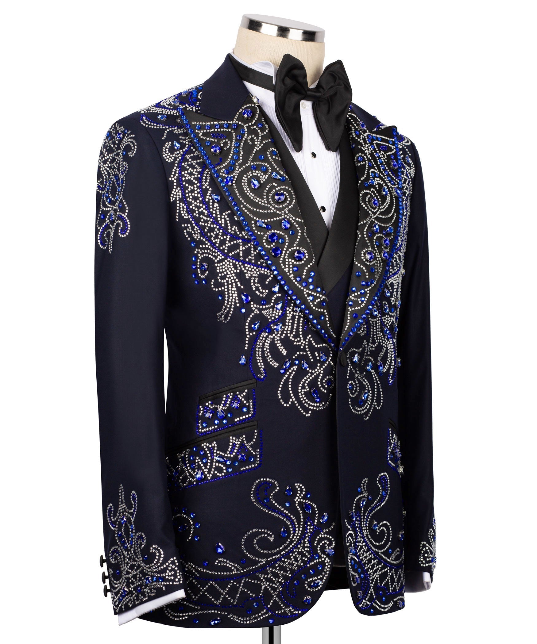 Black tuxedo jacket with blue and silver rhinestone paisley embroidery, angled view