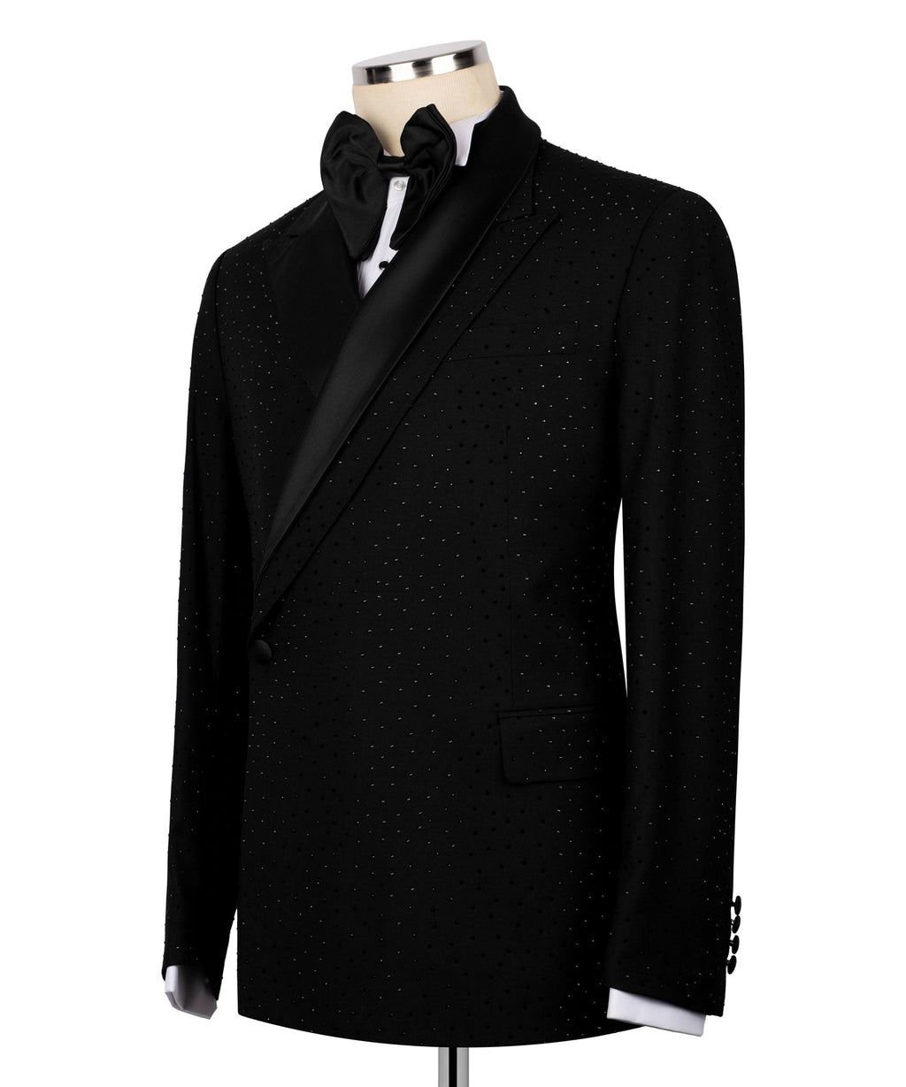 Black tuxedo jacket with stone-speckled texture, satin lapel, and chest pocket