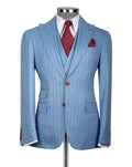 A light blue pinstripe suit jacket displayed on a mannequin torso, styled with a white dress shirt, a red patterned tie, and a matching red pocket square against a light gray background.