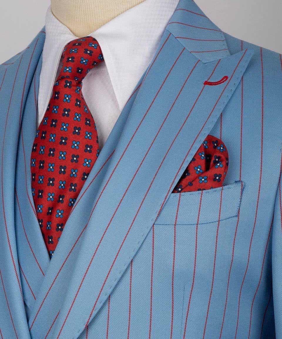 A light blue pinstripe suit jacket displayed on a mannequin torso, styled with a red patterned tie and matching pocket square over a white dress shirt.