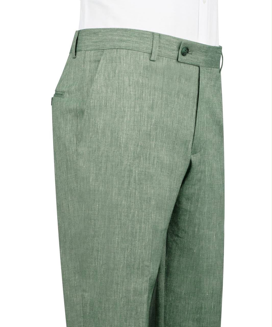 Green pleated pants on a white background