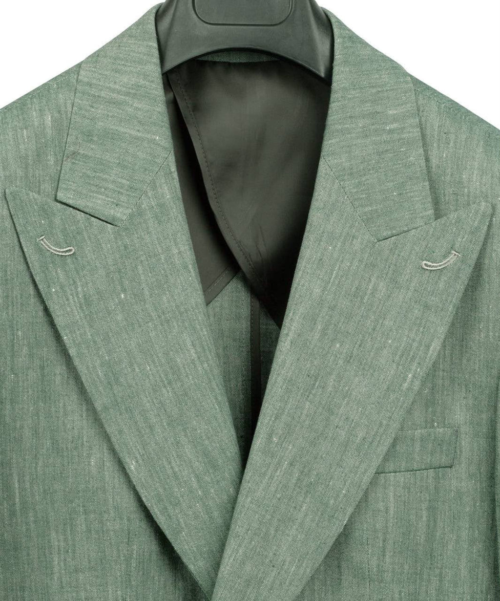 A close-up of a textured sage green blazer jacket with notched lapels and silver-toned peak buttons, shown on a black hanger against a white background.