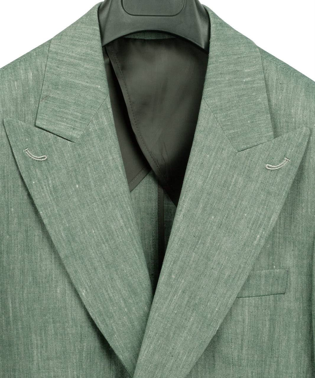 A close-up of a textured sage green blazer jacket with notched lapels and silver-toned peak buttons, shown on a black hanger against a white background.