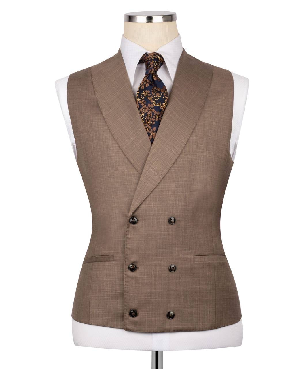 Brown suit vest on a mannequin with a white shirt and patterned tie.