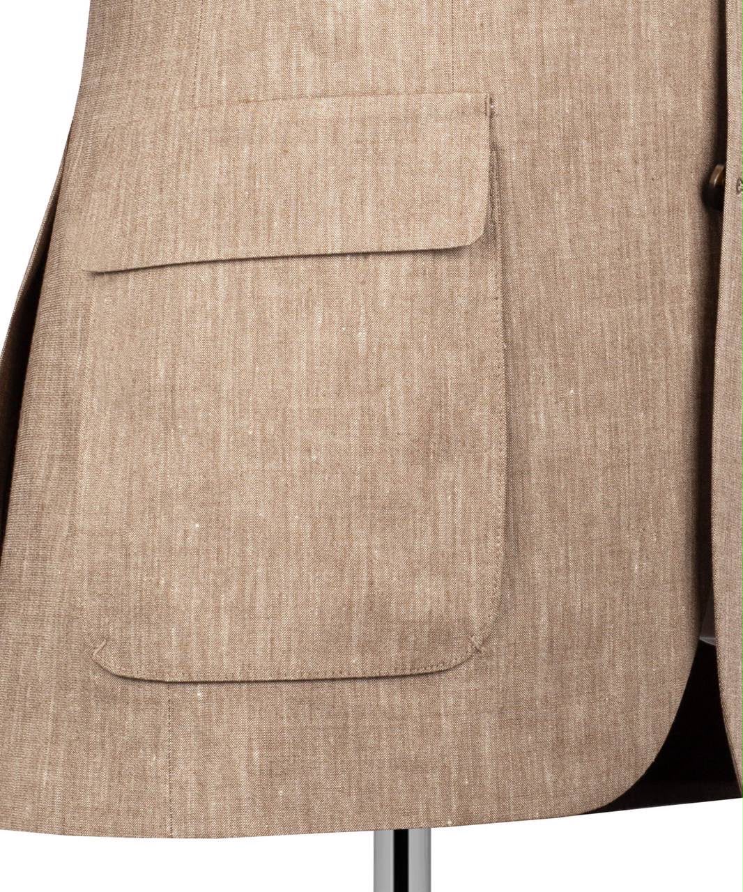 Close-up of a beige textured blazer with a pocket