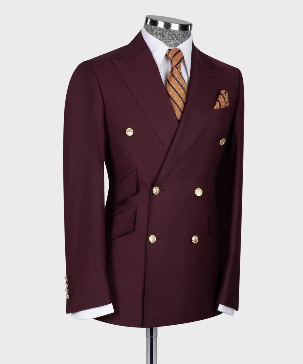 Maroon double-breasted suit jacket with gold buttons on a mannequin 