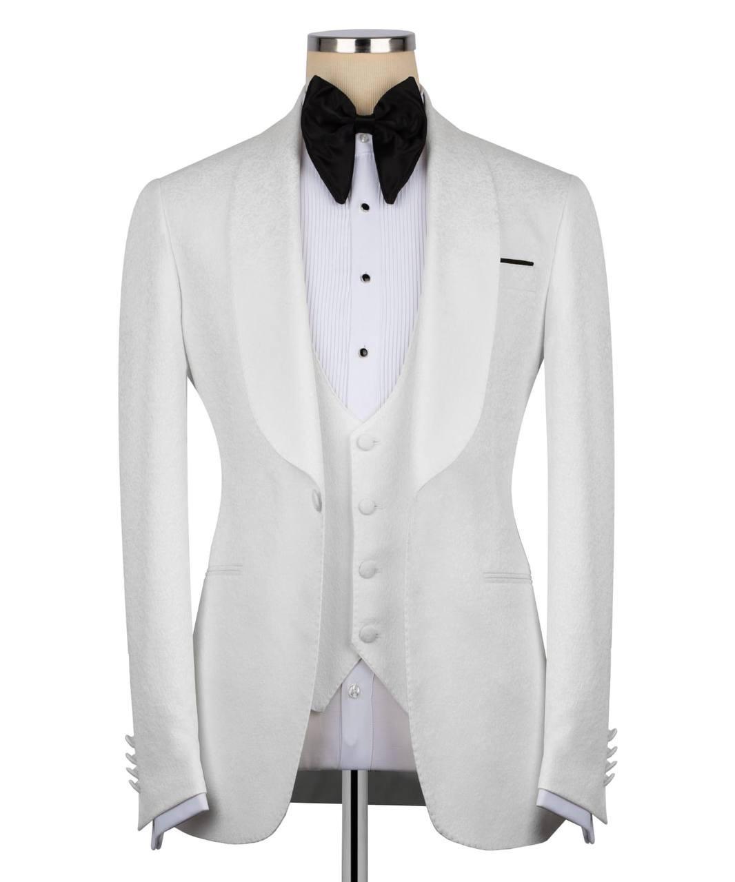 A white tuxedo jacket displayed on a mannequin torso with a white pinstripe vest, white dress shirt, and black bow tie against a plain white background.