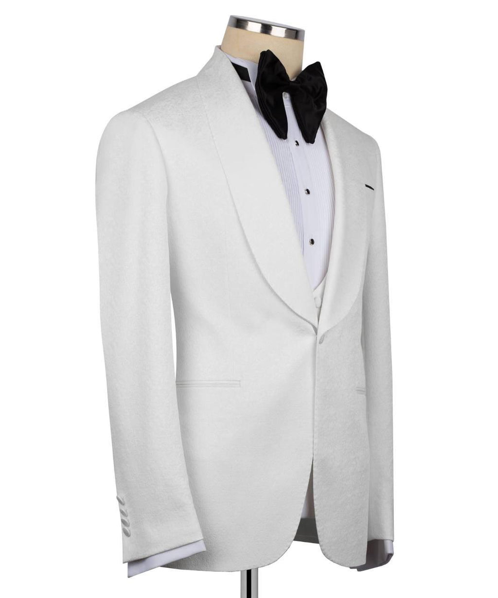 White tuxedo jacket with black bow tie on a mannequin against a white background
