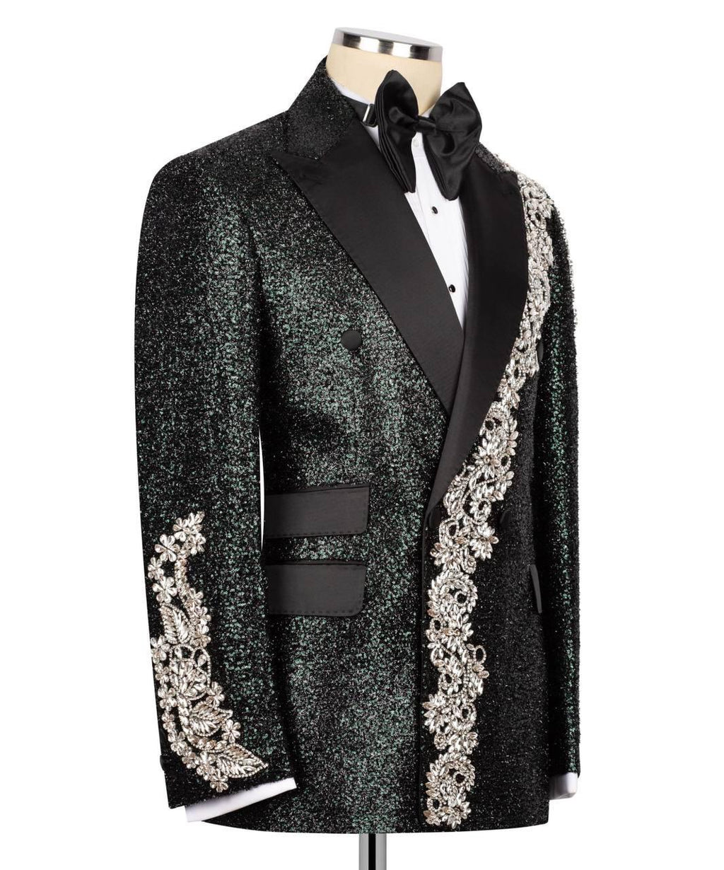 Elegant black tuxedo with floral embroidery on a white background