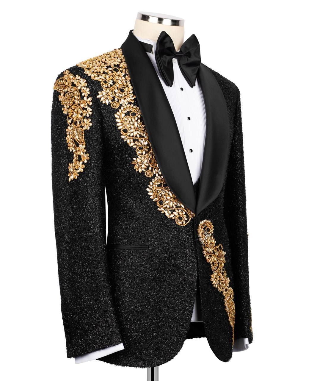 Black tuxedo with gold embroidery on a white background