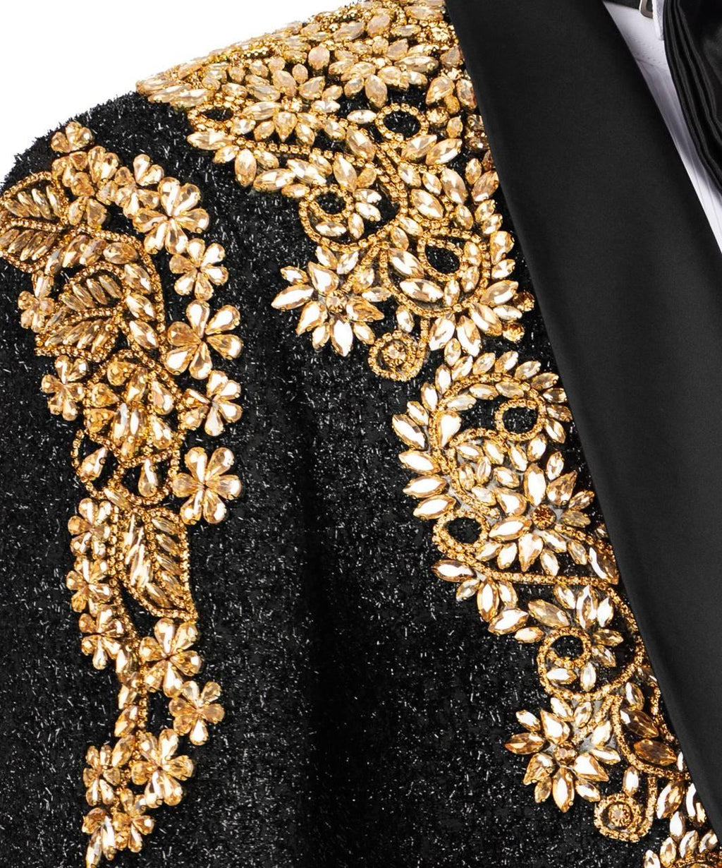 Black fabric with gold floral embroidery