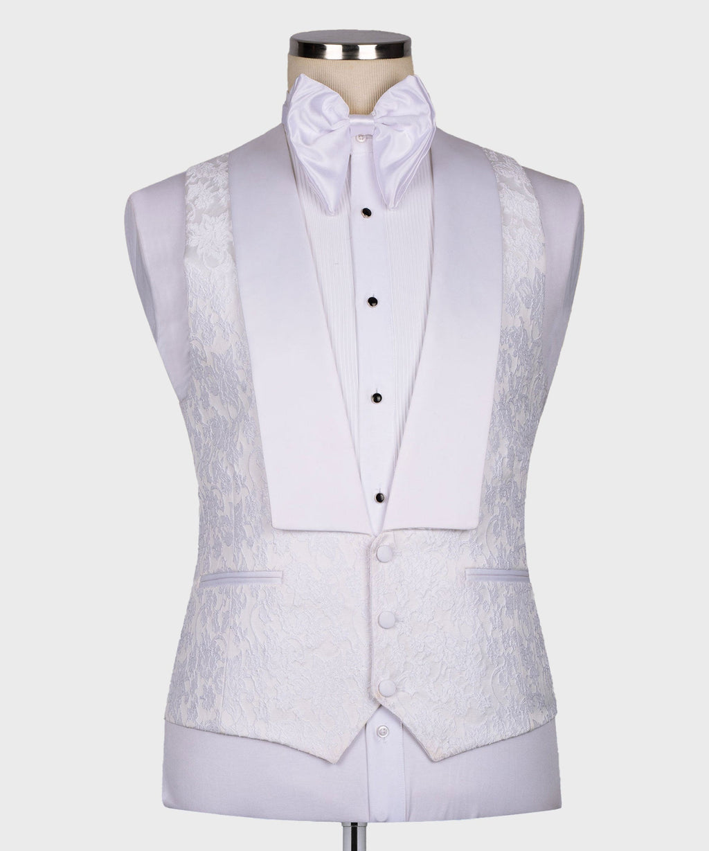 White tuxedo waistcoat and jacket with patterned lapels; pointed collar bow tie