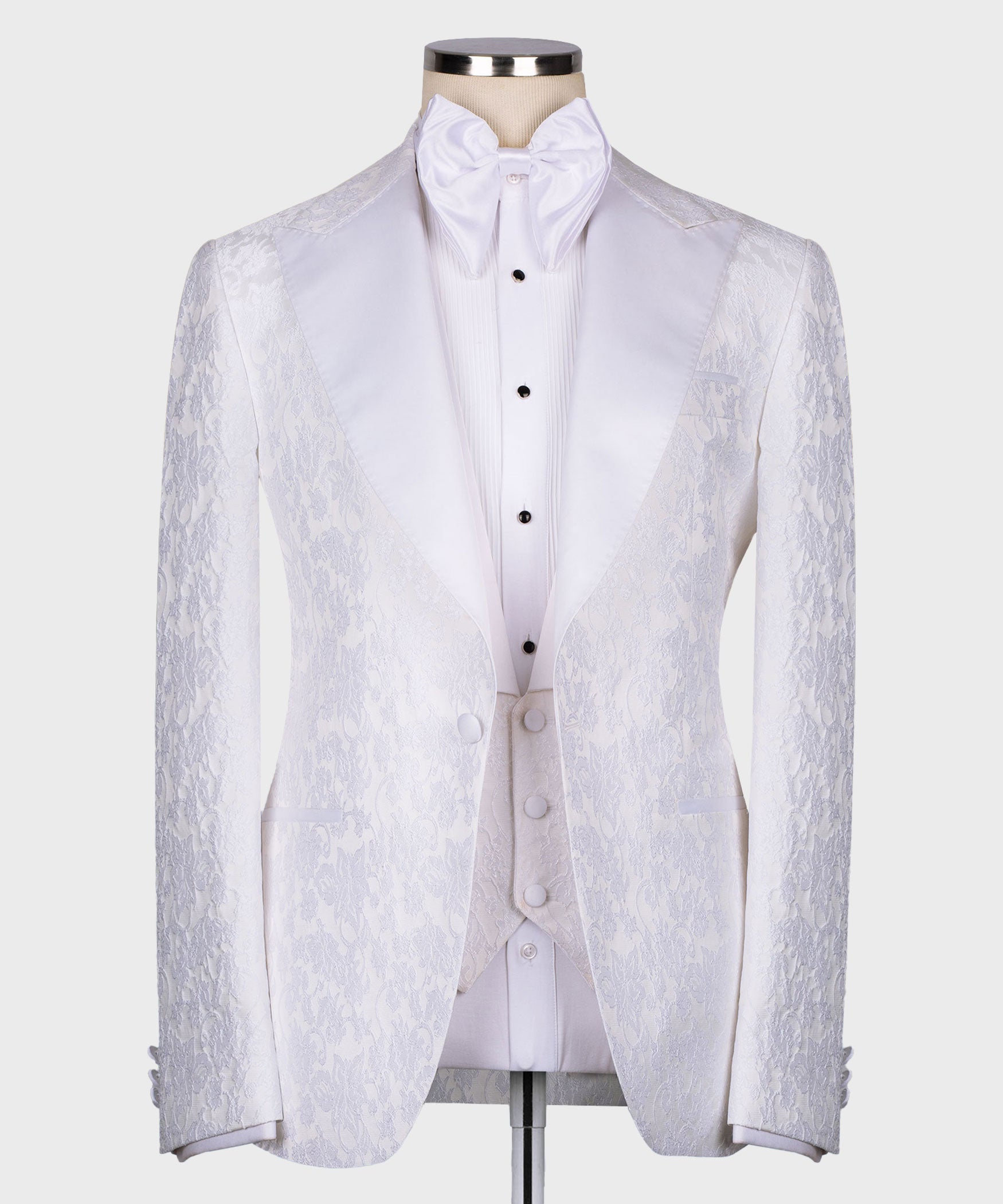 White pointed-collar tuxedo jacket with matching waistcoat and bow tie, three-piece set